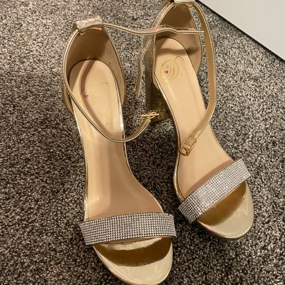 Gold heels.